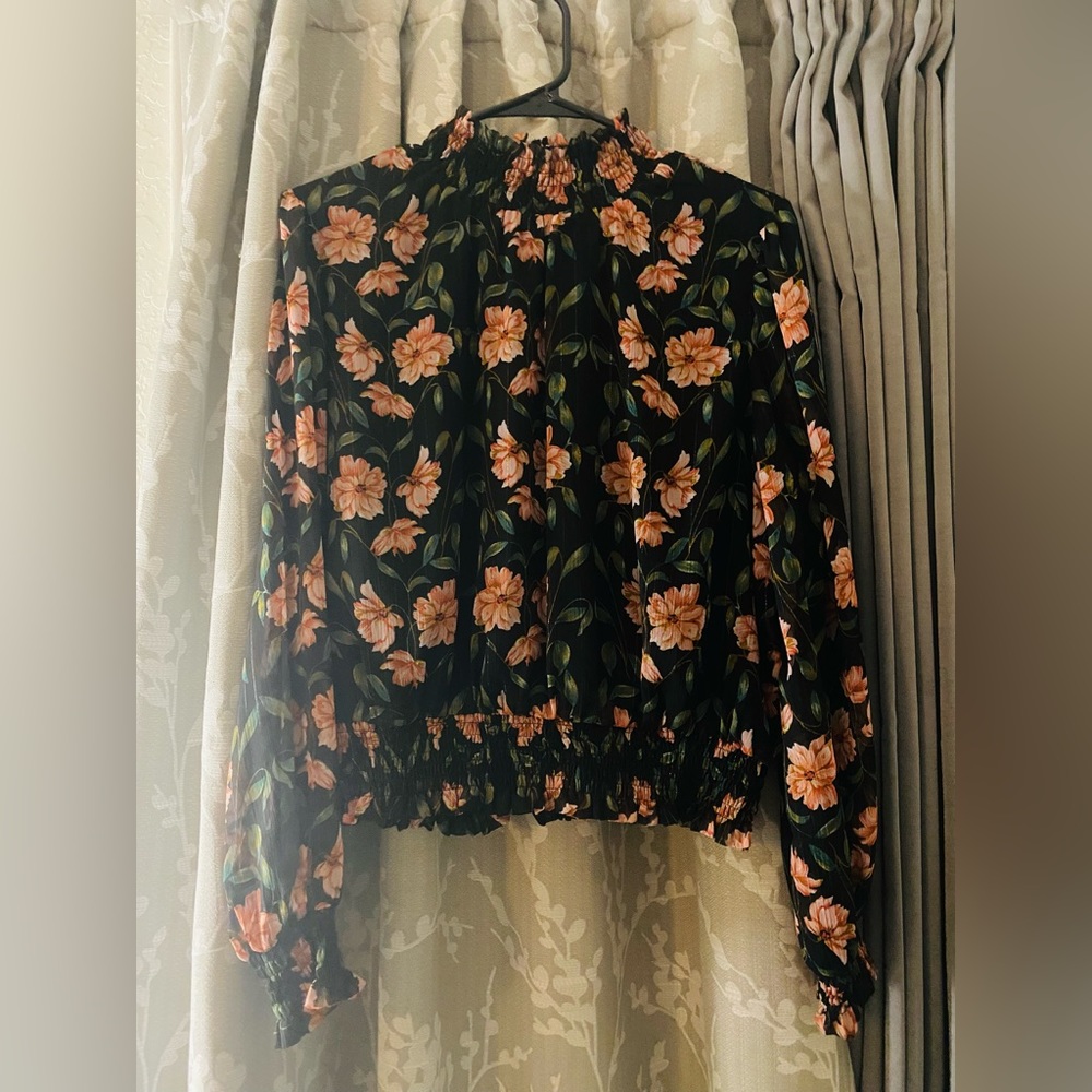 Black, floral long sleeve shirt.